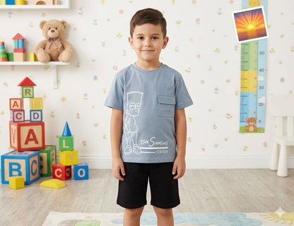 The Nile Luxuries boy wearing a blue Bart Simpson graphic t-shirt with a chest pocket and black shorts in a playroom.
