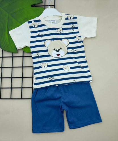 The Nile Luxuries toddler pajama set with a striped bear graphic t-shirt and solid blue shorts.