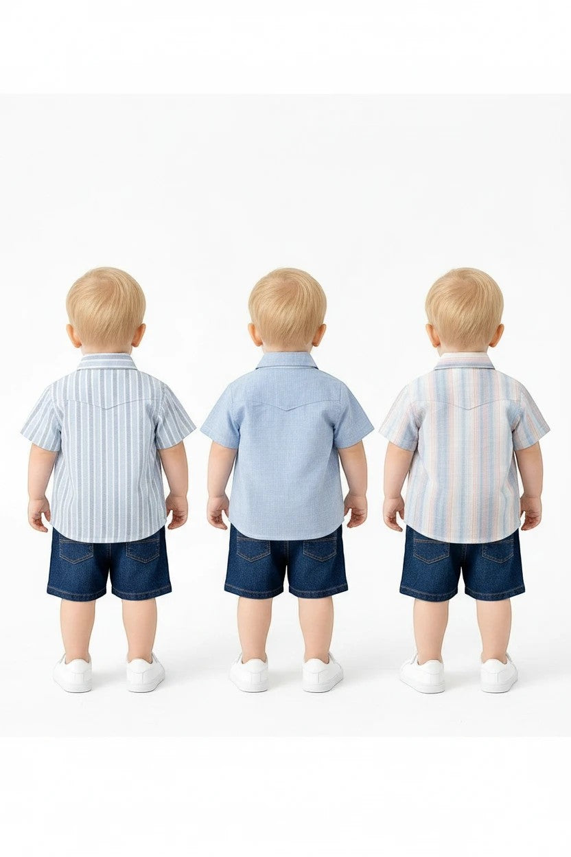 Three toddlers from The Nile Luxuries wearing short-sleeved button-down shirts and denim shorts against white background