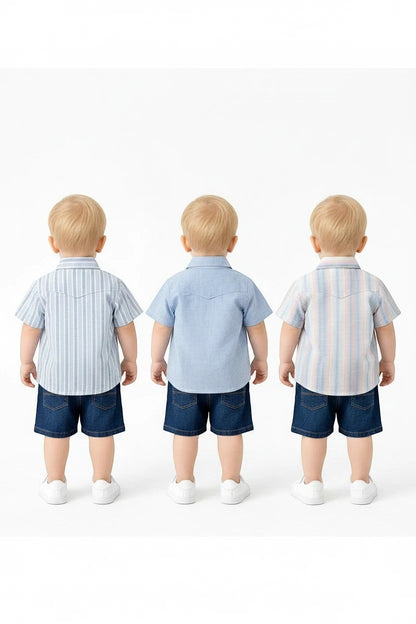 Three toddlers from The Nile Luxuries wearing short-sleeved button-down shirts and denim shorts against white background