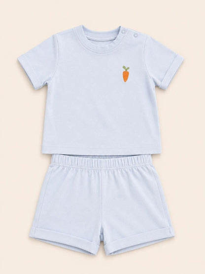The Nile Luxuries toddler light blue short sleeve shirt and shorts set with an embroidered carrot on the chest.