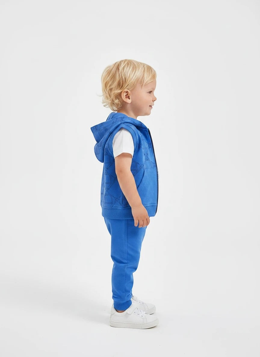 Toddler boy wearing The Nile Luxuries royal blue equestrian hooded vest, white t-shirt, and matching jogger pants.