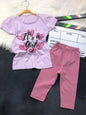 The Nile Luxuries toddler girl outfit set with a lilac graphic t-shirt and matching pink stretchy leggings.