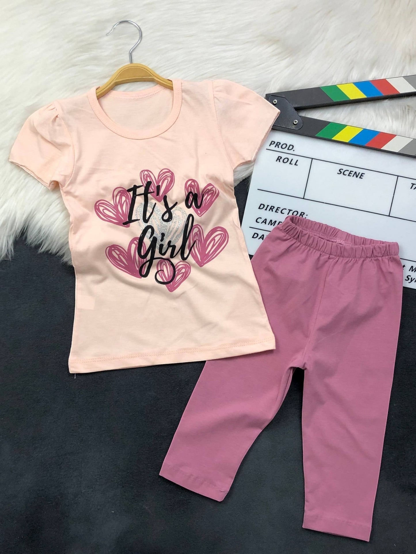 The Nile Luxuries toddler girl outfit set with a peach heart graphic t-shirt and mauve stretchy leggings.