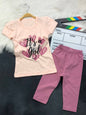 The Nile Luxuries toddler girl outfit set with a peach heart graphic t-shirt and mauve stretchy leggings.