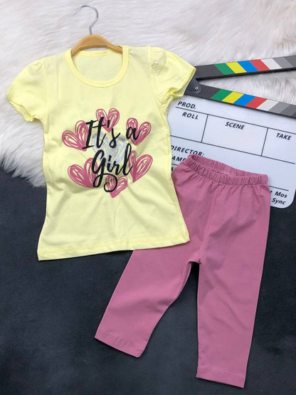 The Nile Luxuries toddler girl outfit set with a yellow graphic t-shirt and pink stretchy leggings.