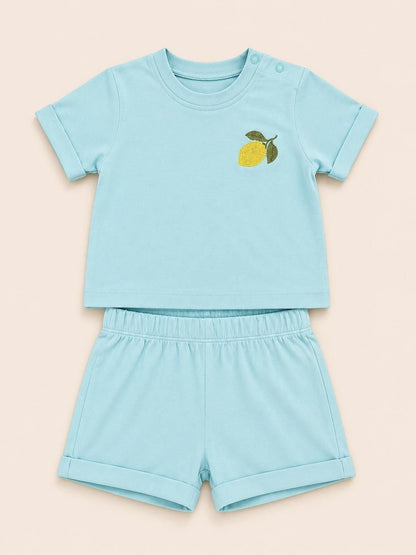 The Nile Luxuries toddler light blue short sleeve shirt and shorts set with a lemon embroidery on the chest.