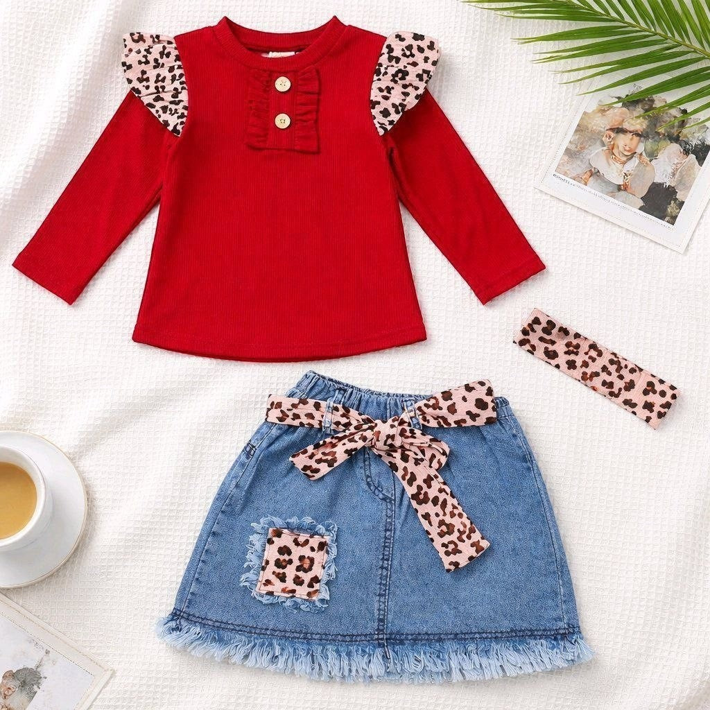 The Nile Luxuries toddler girl red ribbed long sleeve top with ruffled shoulders and denim skirt with leopard print belt