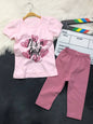 The Nile Luxuries toddler girl outfit featuring a light pink graphic t-shirt and darker pink stretchy leggings.