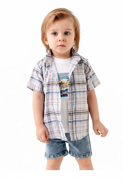 Toddler boy wearing The Nile Luxuries plaid shirt, Good Vibes graphic tee, and denim shorts against white background.