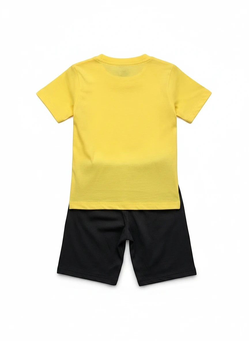 The Nile Luxuries toddler boys yellow short-sleeve t-shirt and black shorts outfit set, back view.