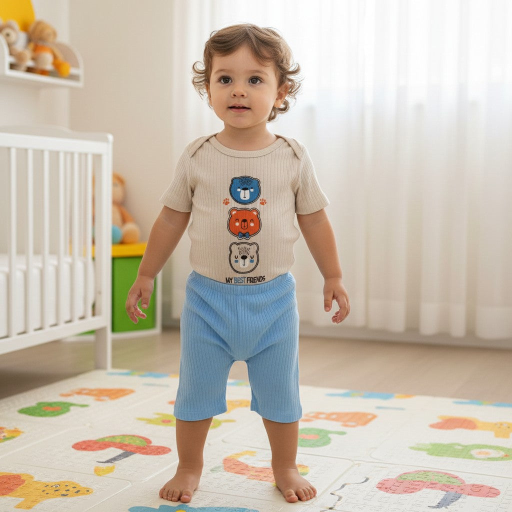 The Nile Luxuries baby boys ribbed knit short sleeve bodysuit with stacked bear graphic and blue shorts.