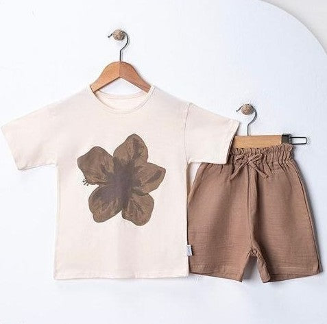 The Nile Luxuries cream t-shirt with brown flower graphic and brown shorts set for baby boys.