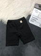 The Nile Luxuries black cotton blend children's bike shorts with elastic waistband.