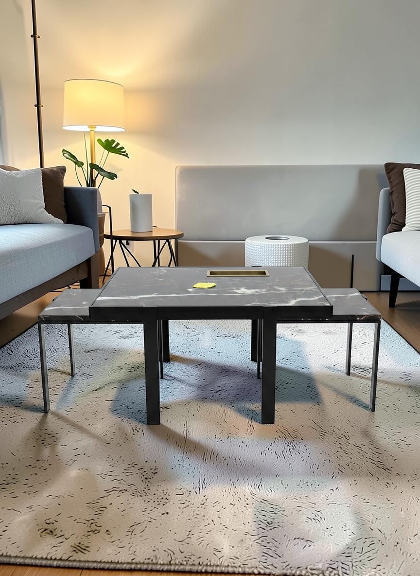 The Nile Luxuries modern nesting accent tables with black marble-effect tops and black metal legs.