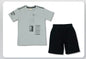 The Nile Luxuries light grey graphic print t-shirt with black shorts set for boys. Cotton blend with abstract graphics and elastic waistband.