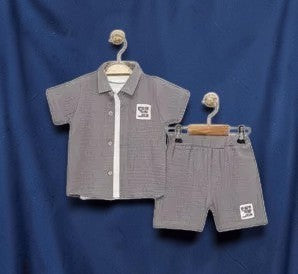 The Nile Luxuries boys' grey gauze short-sleeved collared shirt and elastic-waist shorts set with embroidered patch detail.