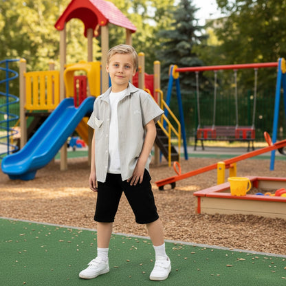 The Nile Luxuries boys' light grey vertical stripe short sleeve shirt with camp collar and triangular pocket detail.