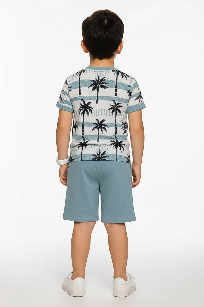 The Nile Luxuries boys' blue palm tree print t-shirt and shorts set. Soft, breathable fabric.