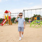 The Nile Luxuries boys' light blue linen-blend polo shirt with navy striped shorts. Features a two-button placket and elastic waistband.
