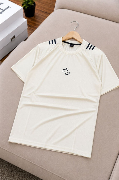 The Nile Luxuries cream athletic t-shirt with navy stripes on shoulders and rhino logo.