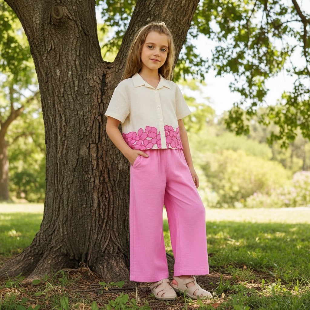 The Nile Luxuries girls' cream cropped shirt with floral embroidery and pink wide-leg pants set.