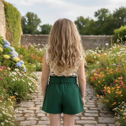 The Nile Luxuries Girls white cherry print top with ruffled sleeves and green paperbag shorts set.