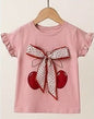 The Nile Luxuries girls dusty rose cotton t-shirt with cherry print and floral bow detail. Ruffled cap sleeves.