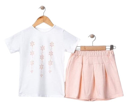 The Nile Luxuries girls' white t-shirt with pink floral print and pink pleated skirt set.
