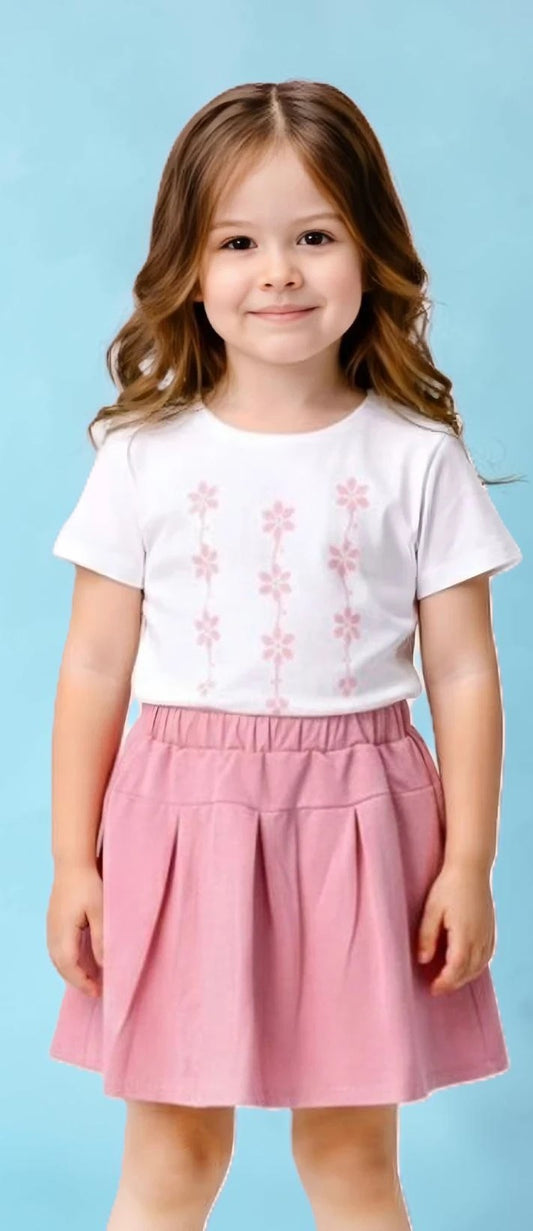 The Nile Luxuries girls' white t-shirt with pink floral print and pink pleated skirt set.