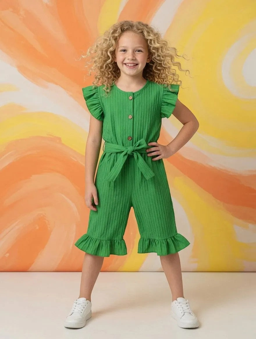 The Nile Luxuries girls green ruffled sleeve jumpsuit with wooden buttons and tie belt.