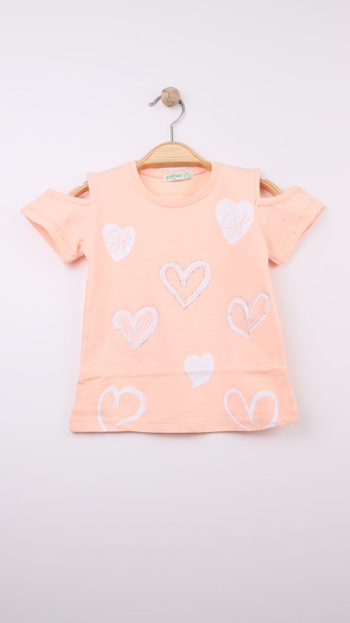 The Nile Luxuries girls peach cotton t-shirt with cold shoulder design and scattered heart prints, some with shimmer.