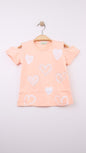 The Nile Luxuries girls peach cotton t-shirt with cold shoulder design and scattered heart prints, some with shimmer.