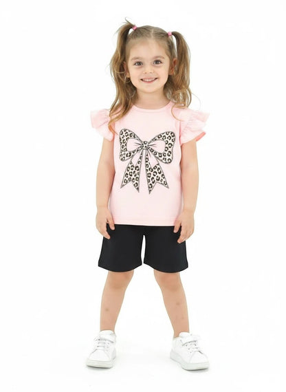 The Nile Luxuries girls pink t-shirt with leopard bow graphic and black shorts set. Ruffled sleeves.