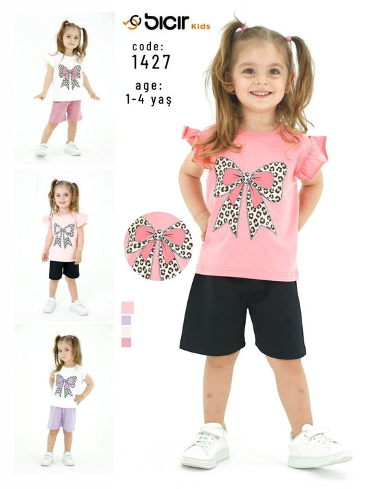 The Nile Luxuries girls pink t-shirt with leopard bow graphic and black shorts set. Ruffled sleeves.