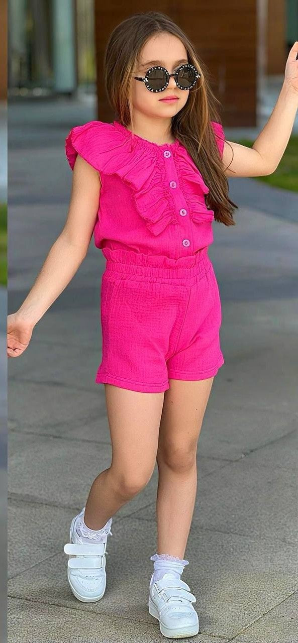 The Nile Luxuries girls' bright pink cotton gauze ruffled button-front top and elastic waist shorts set.