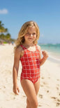 The Nile Luxuries girls' red one-piece swimsuit with white grid pattern. Perfect for beach and pool.