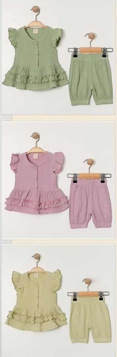 The Nile Luxuries girls' pastel green ruffled sleeve top and bloomer shorts set, made of cotton.