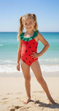 The Nile Luxuries girls red one-piece swimsuit with green ruffle trim and black strawberry print