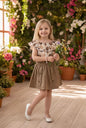 The Nile Luxuries Girls taupe floral print ruffle top and button skirt set with elastic waistband.