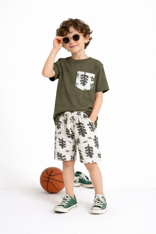 The Nile Luxuries boys' olive green t-shirt with leaf print pocket and matching leaf print shorts.