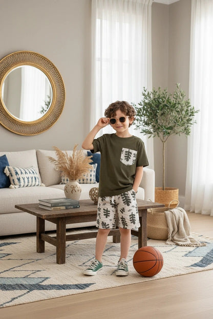 The Nile Luxuries boys' olive green t-shirt with leaf print pocket and matching shorts set.