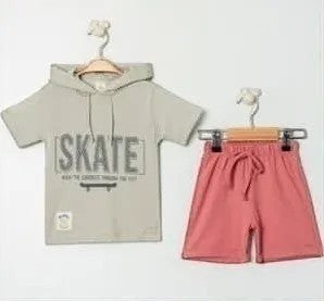 The Nile Luxuries kids light grey short-sleeve hoodie with 'SKATE' graphic and pink shorts set, made of cotton.