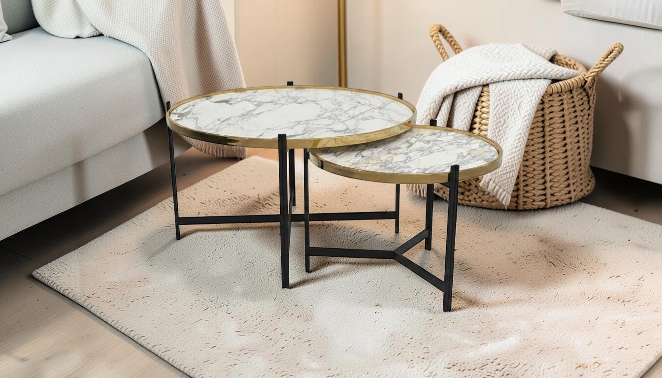 The Nile Luxuries nesting coffee tables with white and grey marble tops and gold trim, on black metal legs.