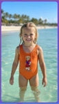 The Nile Luxuries orange one-piece swimsuit for girls with teddy bear graphic. Perfect for beach or pool.