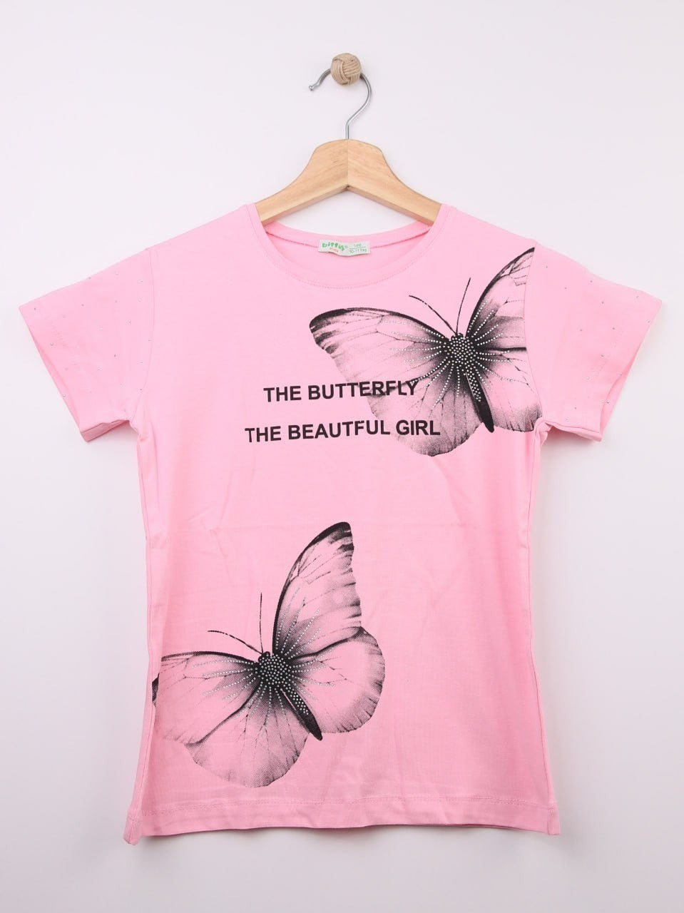 The Nile Luxuries pink cotton blend t-shirt with rhinestone butterflies and distressed short sleeves.