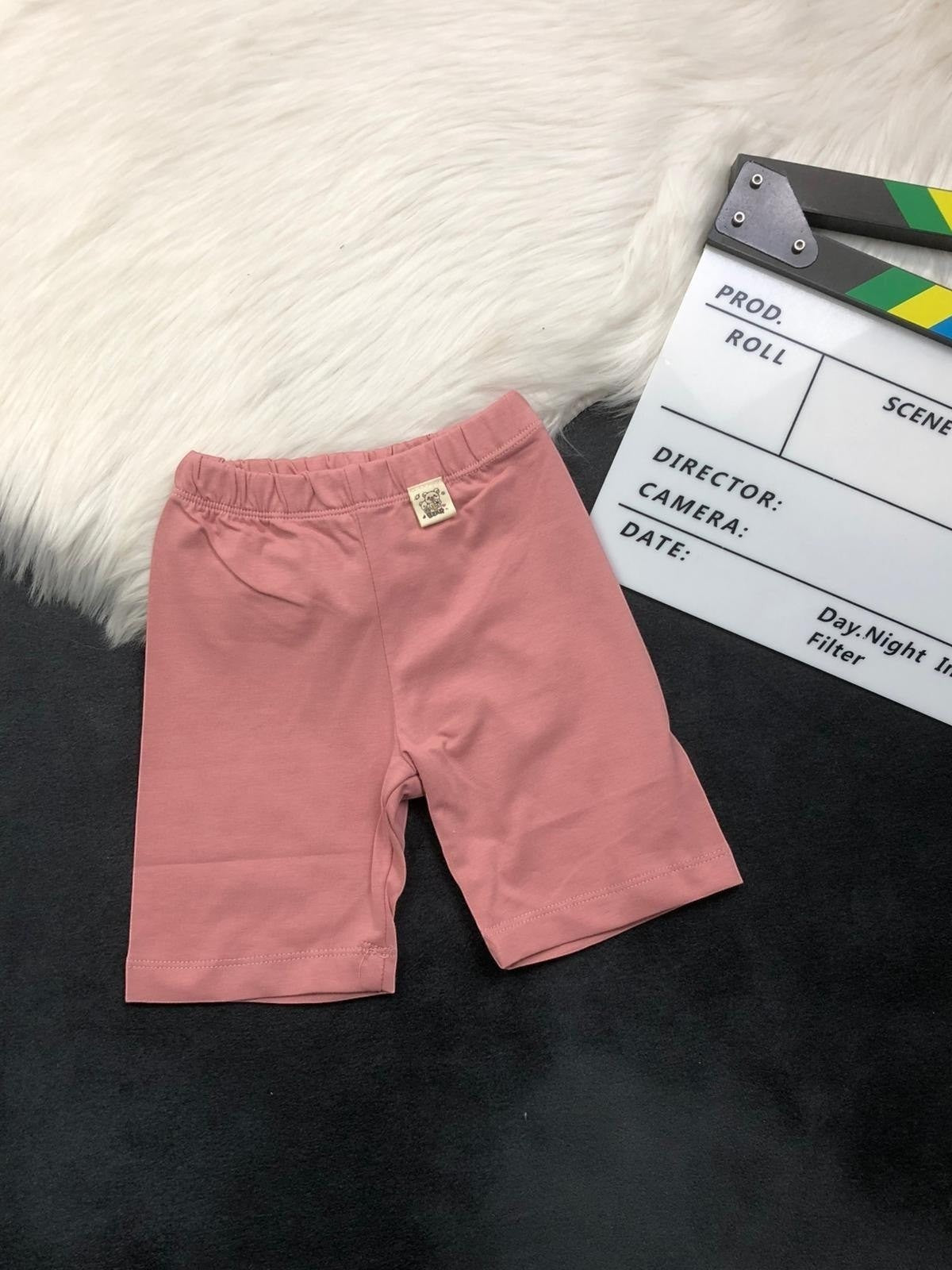 The Nile Luxuries rose pink cotton blend children's bike shorts with elastic waistband.