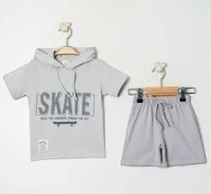 The Nile Luxuries light grey cotton short-sleeve hoodie and shorts set with "SKATE" graphic print and skateboard design.