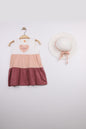 The Nile Luxuries sleeveless tiered dress with heart graphic saying "Love", color blocked in white, peach, and rose.