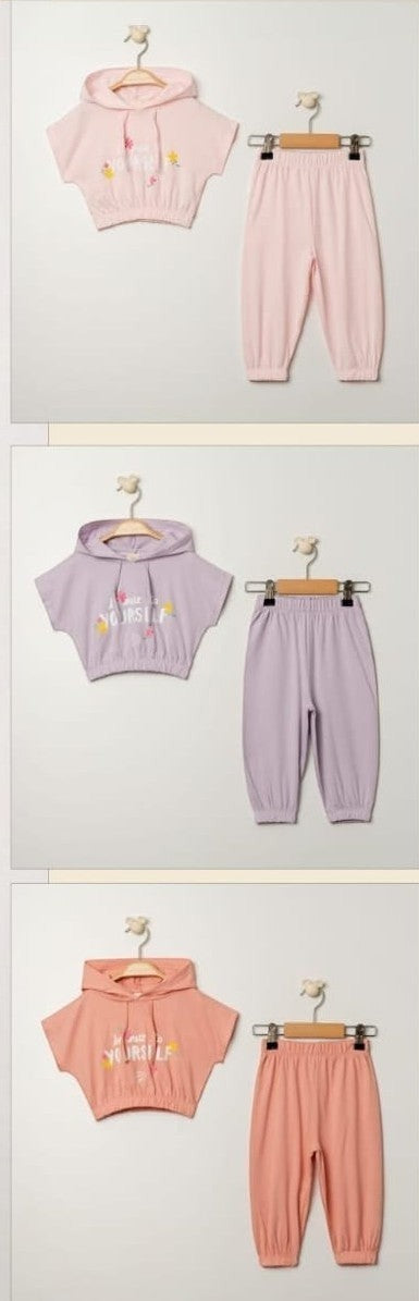 The Nile Luxuries toddler girls pastel pink cotton blend hoodie and joggers set with "Be Nice To Yourself" graphic and floral accents.